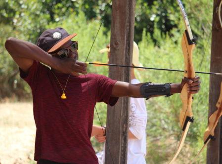 boy practicing archery
