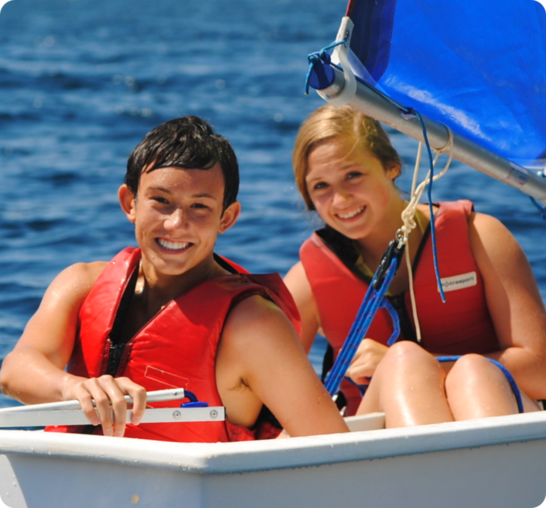 boy and girl in sailboat