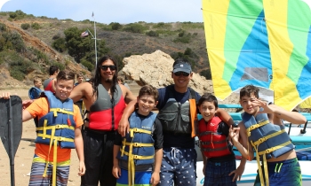 group of boys in life vests
