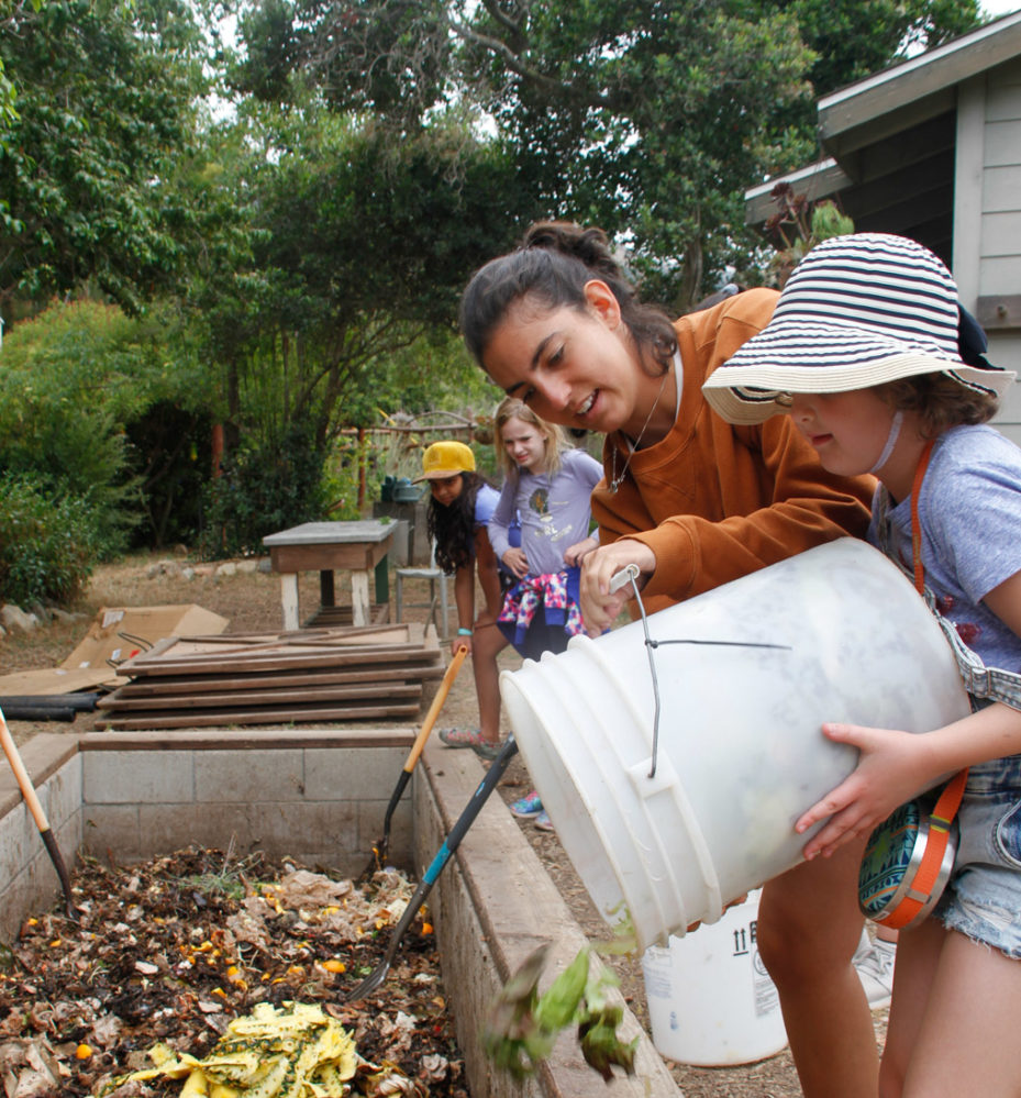 working on the camp compost