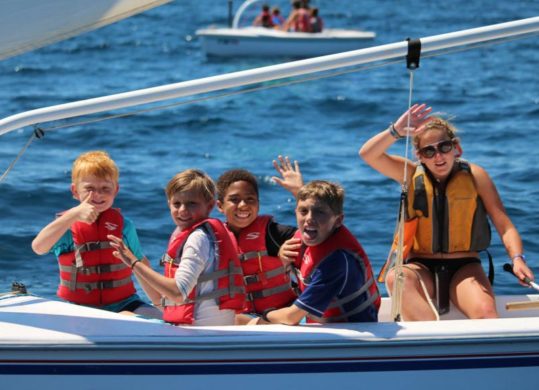 kids in a boat